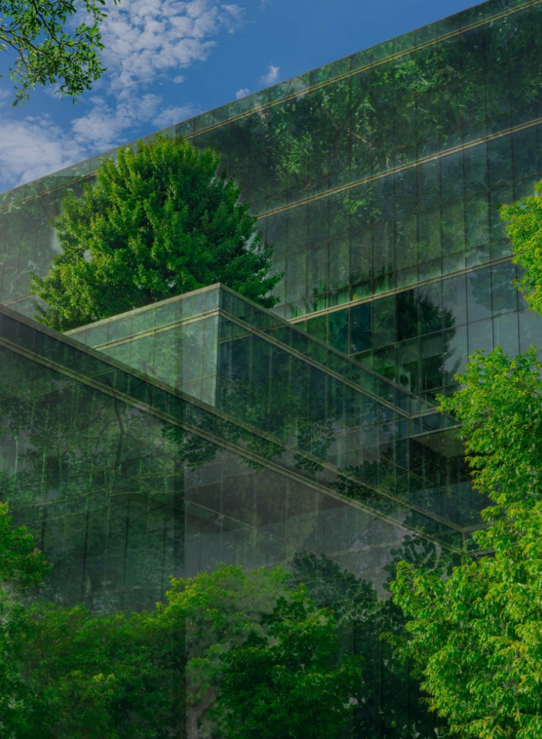 an office building surrounded by trees